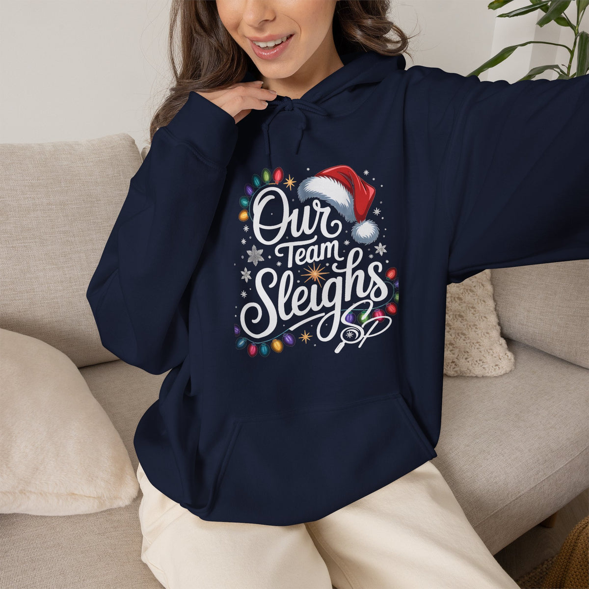 Our Team Sleighs Search Perfect Hoodie — Christmas Lights & Santa Hat Pullover